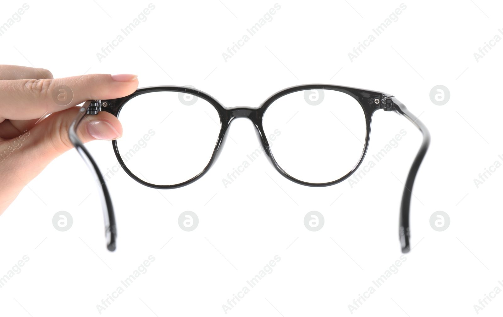 Photo of Woman holding glasses with black frame on white background, closeup