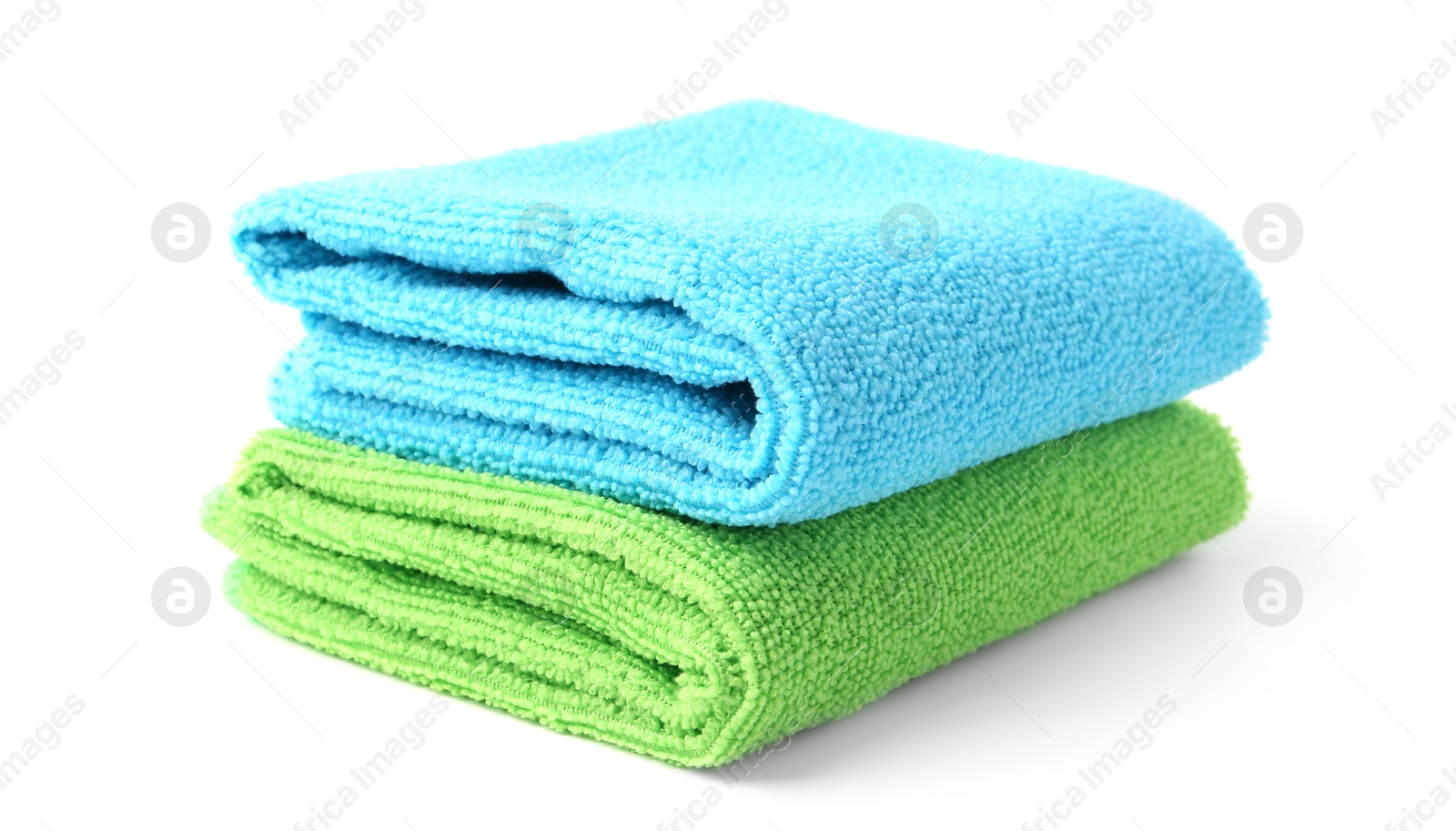 Photo of Green and light blue microfiber cloths isolated on white