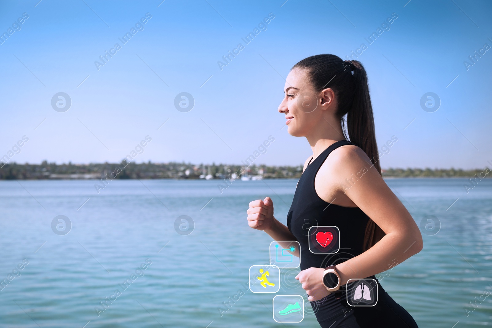 Image of Woman with smart watch running near river outdoors. Icons near device