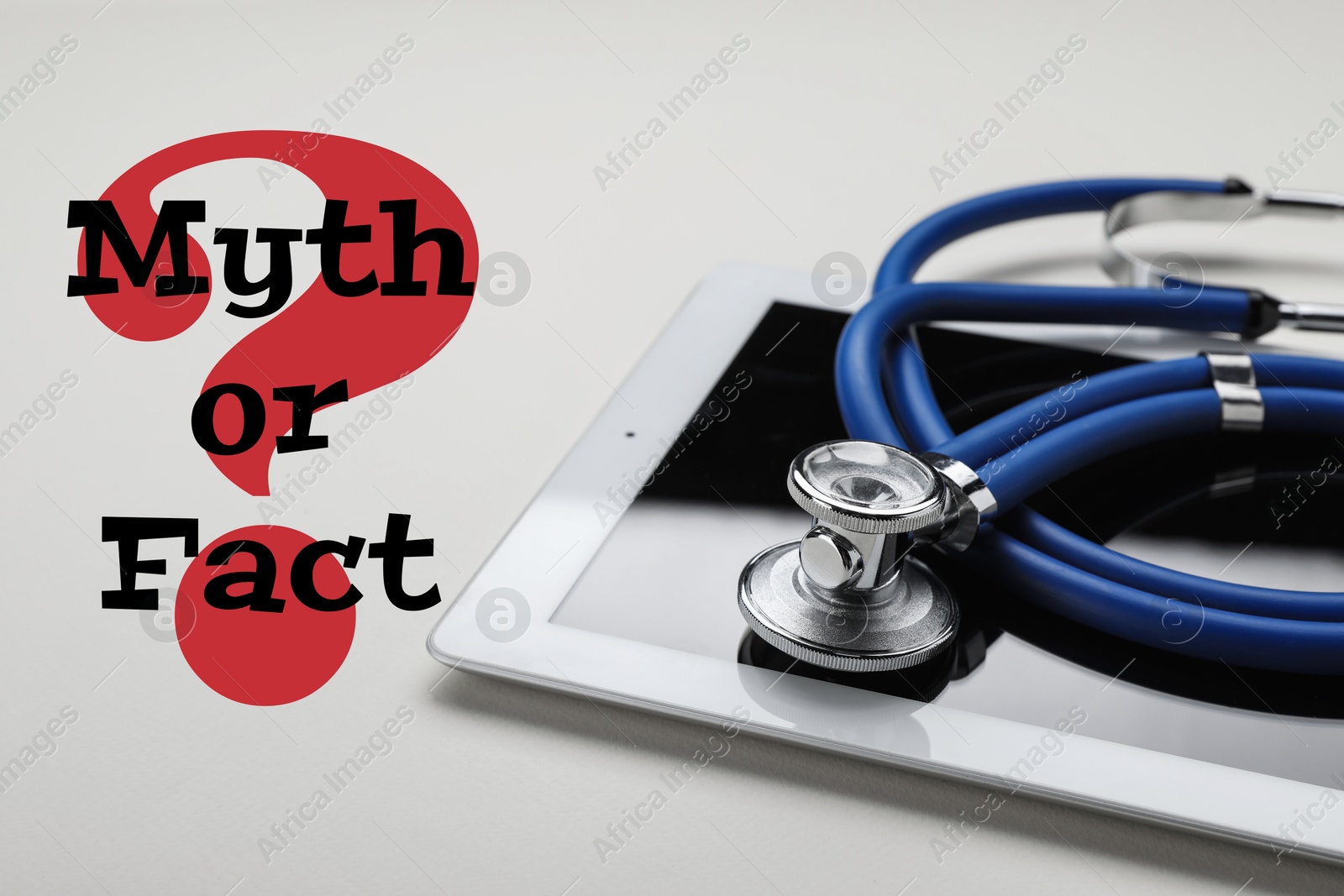 Image of Medical myths. Tablet and stethoscope near question mark with words on white background