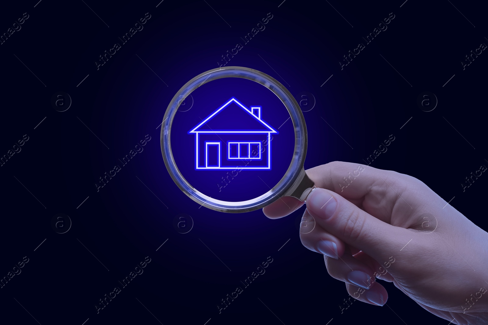 Image of Search for housing. Woman holding magnifying glass with building icon on black background, closeup