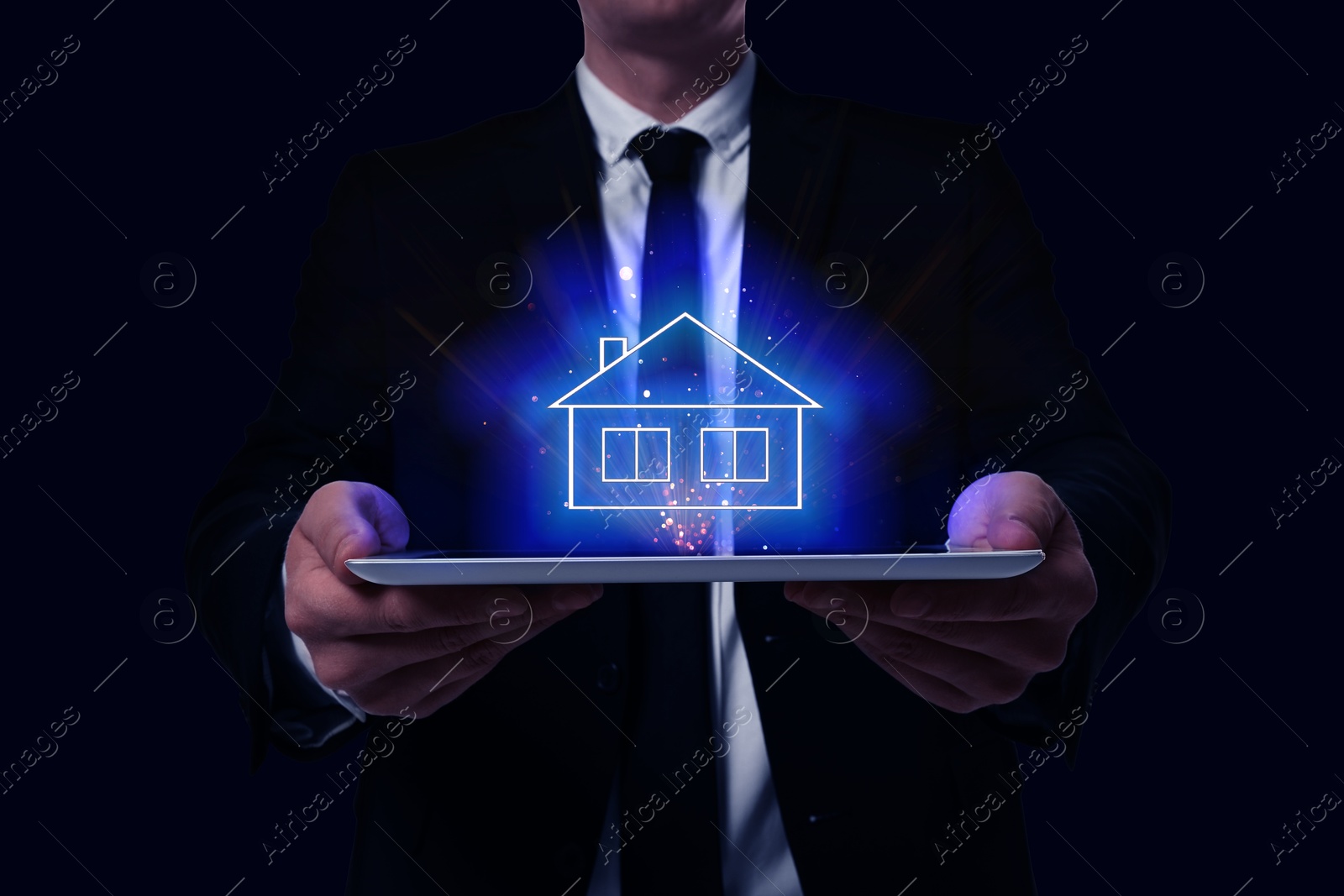 Image of Search for housing. Real estate agent holding tablet computer on black background, closeup. Illustration of house over device