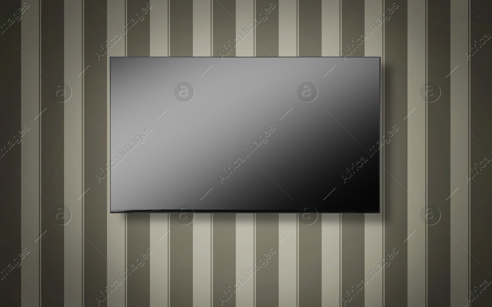 Image of Tv set with flat screen mounted on wall