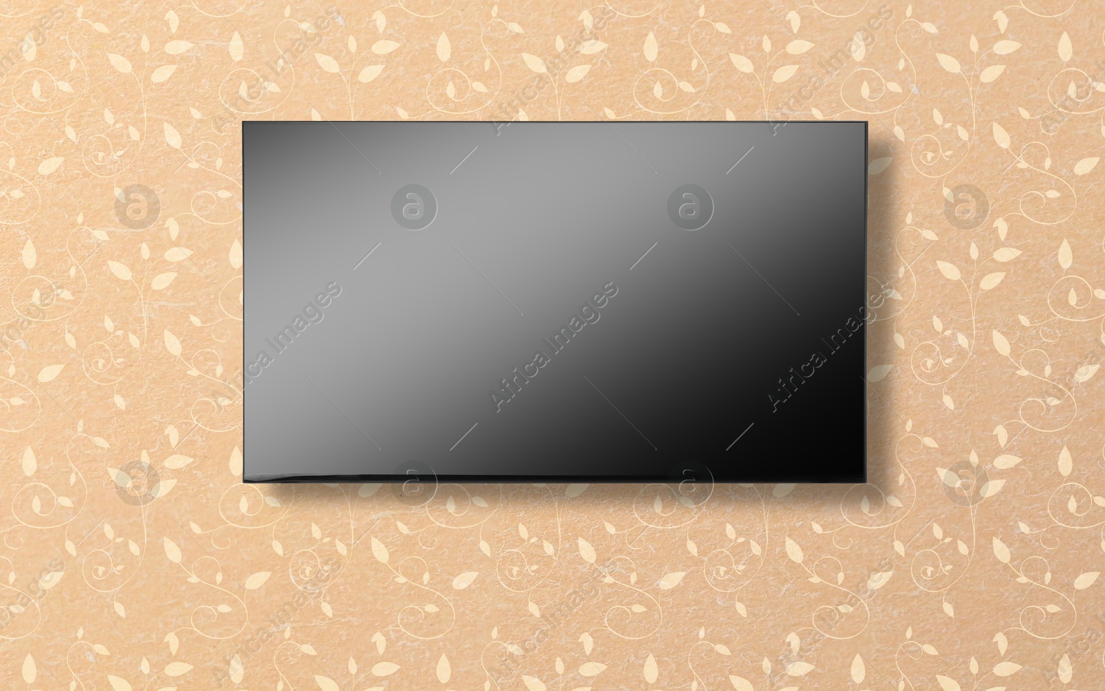 Image of Tv set with flat screen mounted on wall