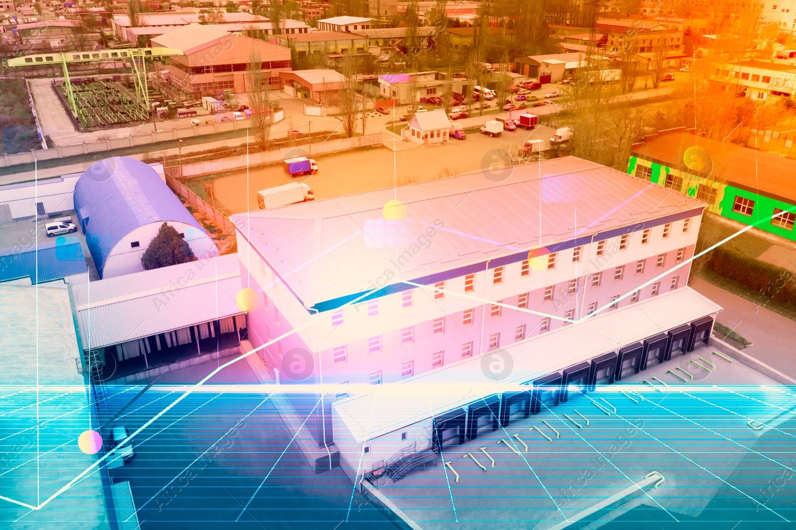 Image of Aerial view of warehouse with loading docks outdoors, color toned. Logistics center