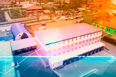 Image of Aerial view of warehouse with loading docks outdoors, color toned. Logistics center