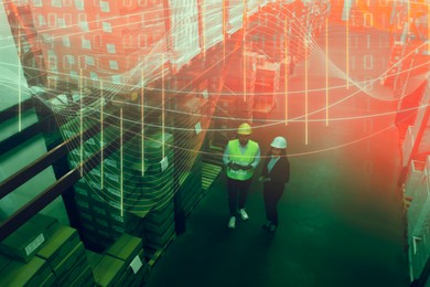 Image of Manager and worker at warehouse, above view. Logistics center. Color toned