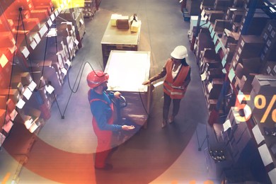 Image of Manager and worker at warehouse, above view. Logistics center. Graphs