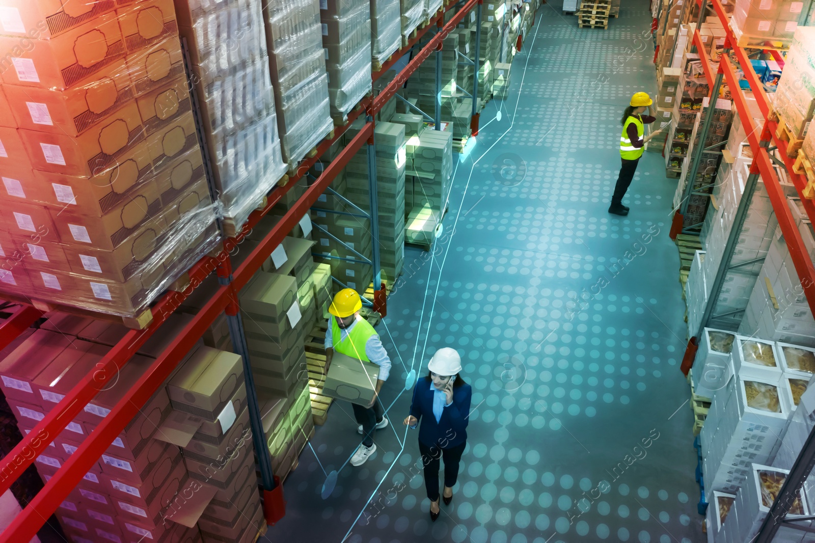 Image of Manager and workers at warehouse, above view. Logistics center