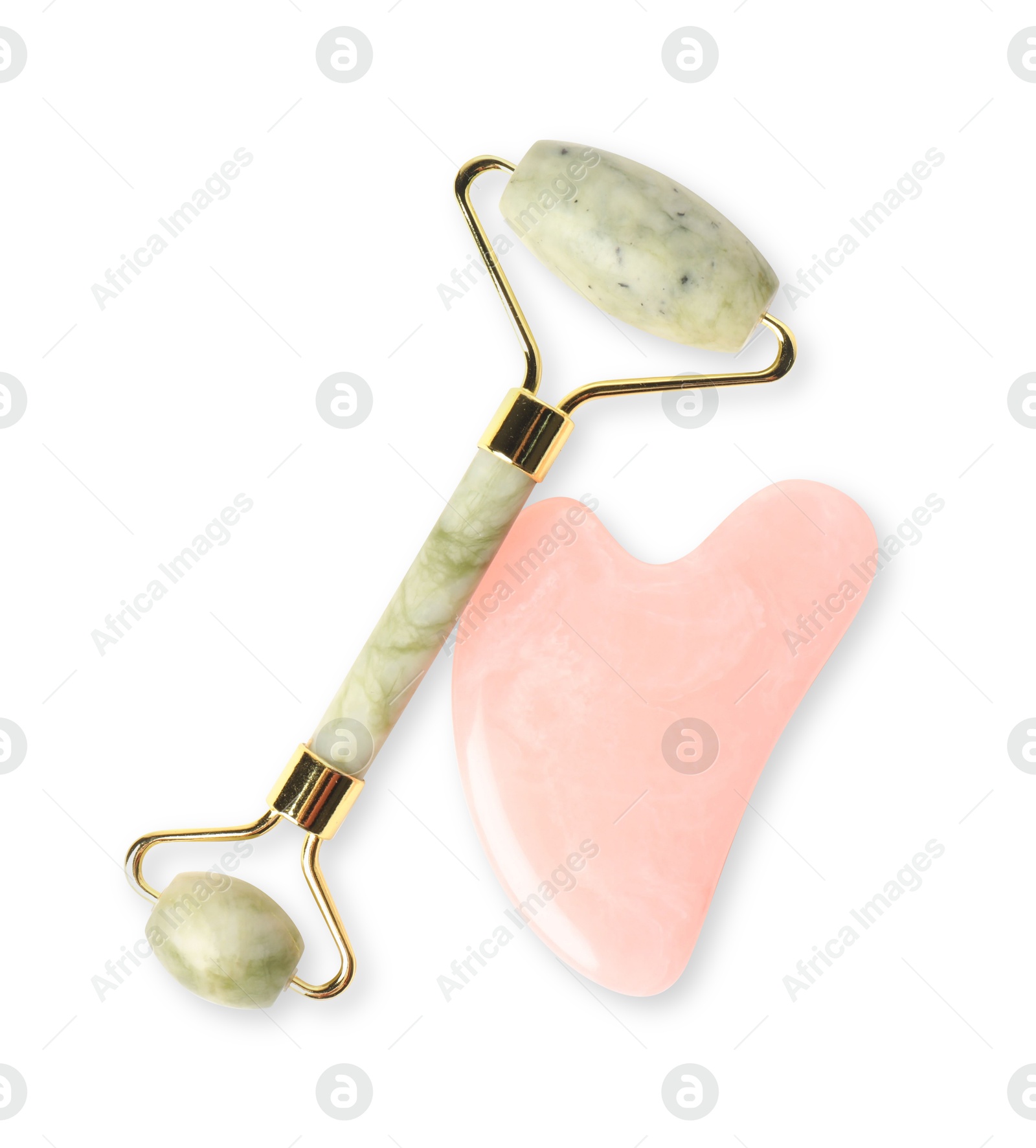 Photo of Face roller and gua sha tool isolated on white, top view