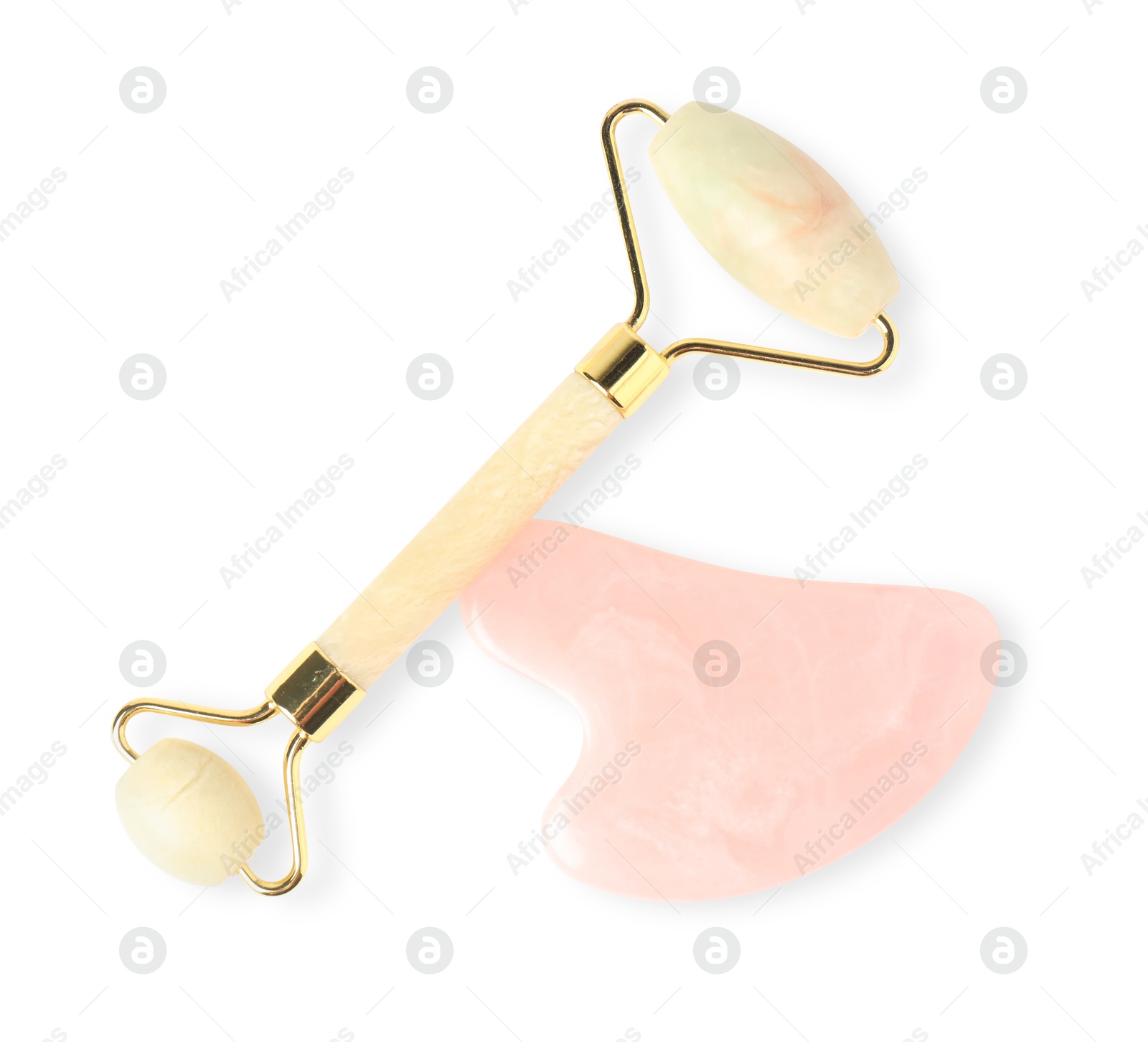 Photo of Face roller and gua sha tool isolated on white, top view