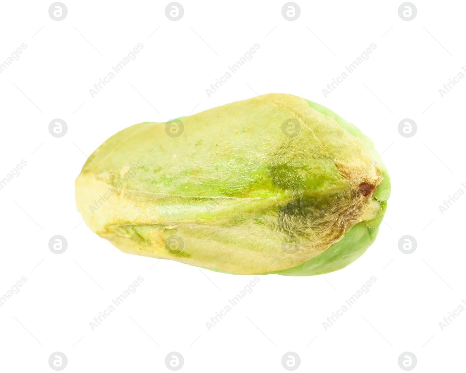 Photo of One peeled pistachio nut isolated on white