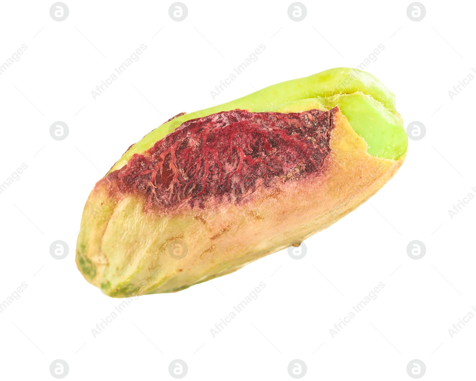 Photo of One peeled pistachio nut isolated on white