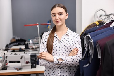 Atelier. Young woman working in professional workshop