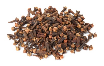 Photo of Pile of dry clove buds on white background. Aromatic spice