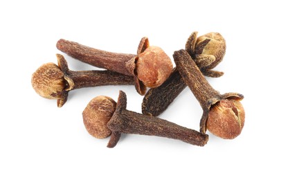 Photo of Dry clove buds on white background. Aromatic spice