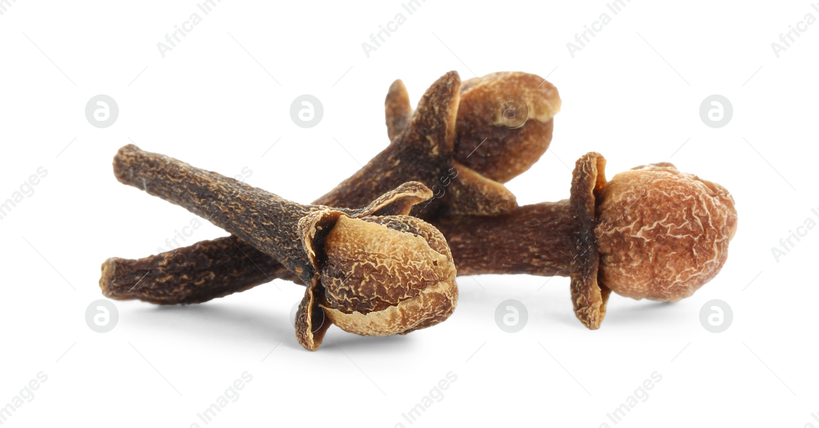 Photo of Dry clove buds on white background. Aromatic spice