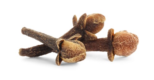 Dry clove buds on white background. Aromatic spice