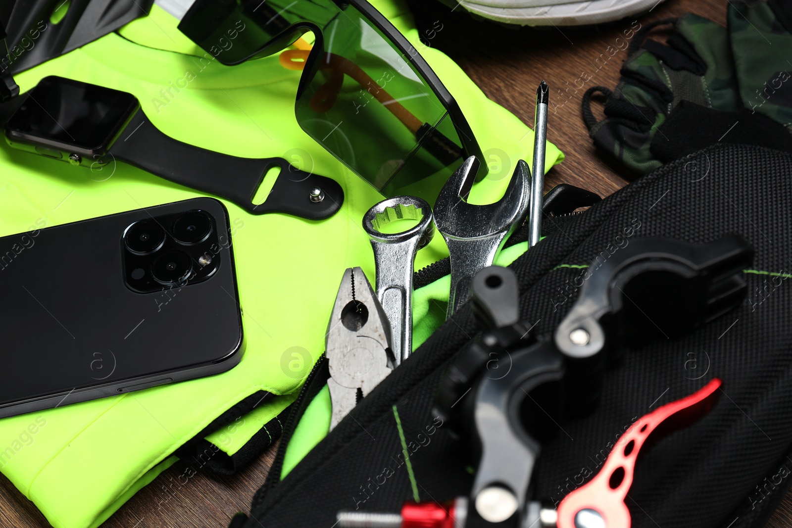 Photo of Bicycle accessories and tools on wooden table