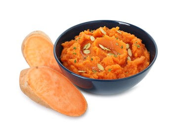 Photo of Tasty mashed sweet potato with pumpkin seeds in bowl and cut vegetables isolated on white