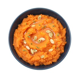 Photo of Tasty mashed sweet potato with pumpkin seeds and thyme in bowl isolated on white, top view