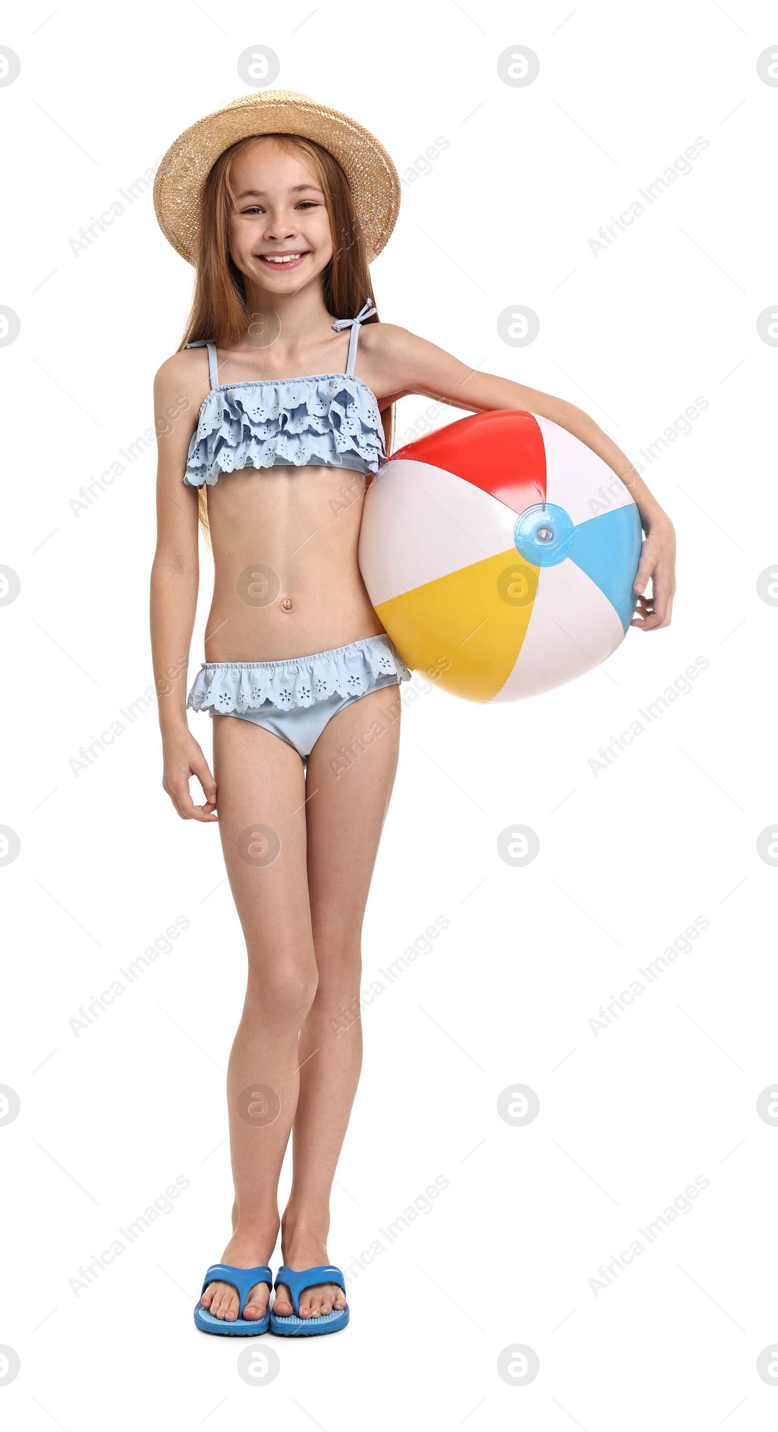 Photo of Happy girl in beachwear with inflatable ball on white background