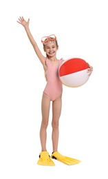 Happy girl in beachwear with diving mask, flippers and inflatable ball on white background