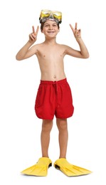 Little boy in beachwear with diving mask and flippers on white background