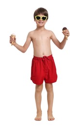 Little boy in beachwear holding ice cream on white background