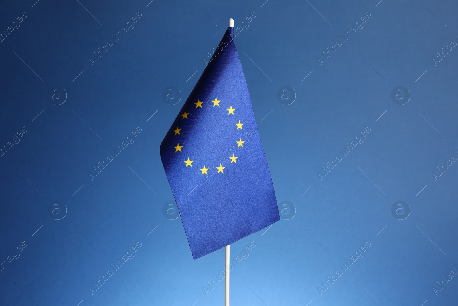 Photo of One flag of European Union on blue background