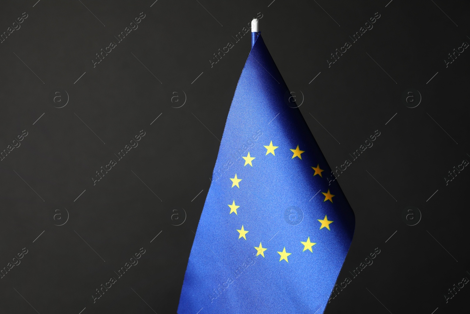 Photo of One flag of European Union on black background