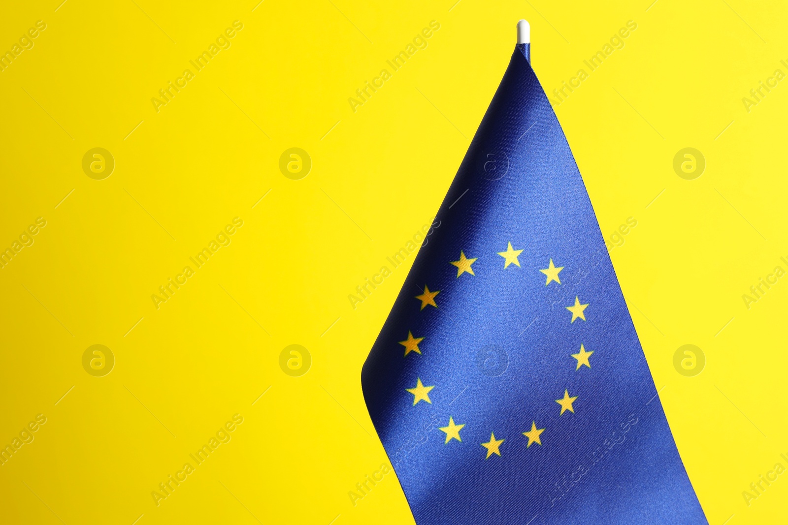 Photo of Flag of European Union on yellow background