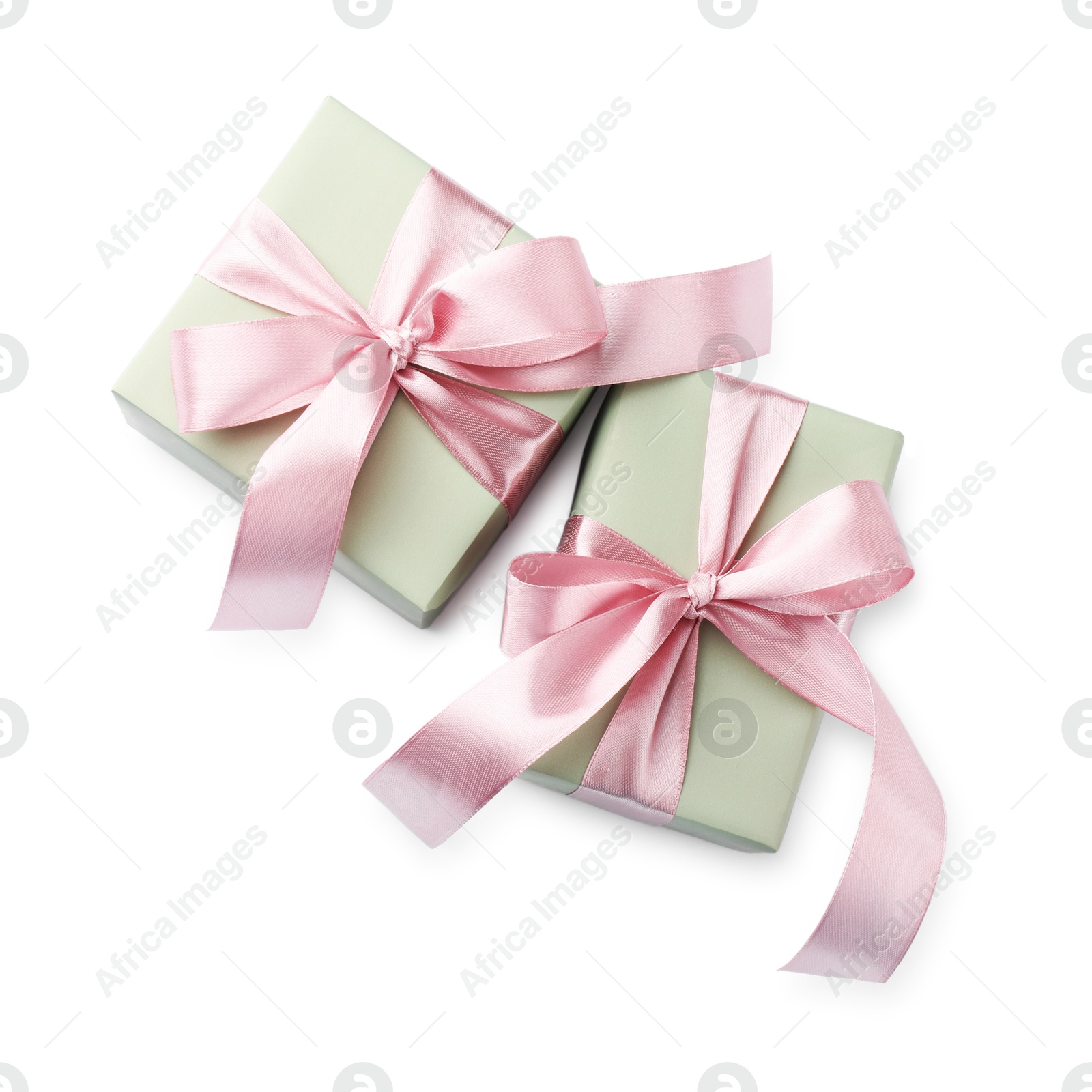 Photo of Beautiful gift boxes with pink bows isolated on white, top view