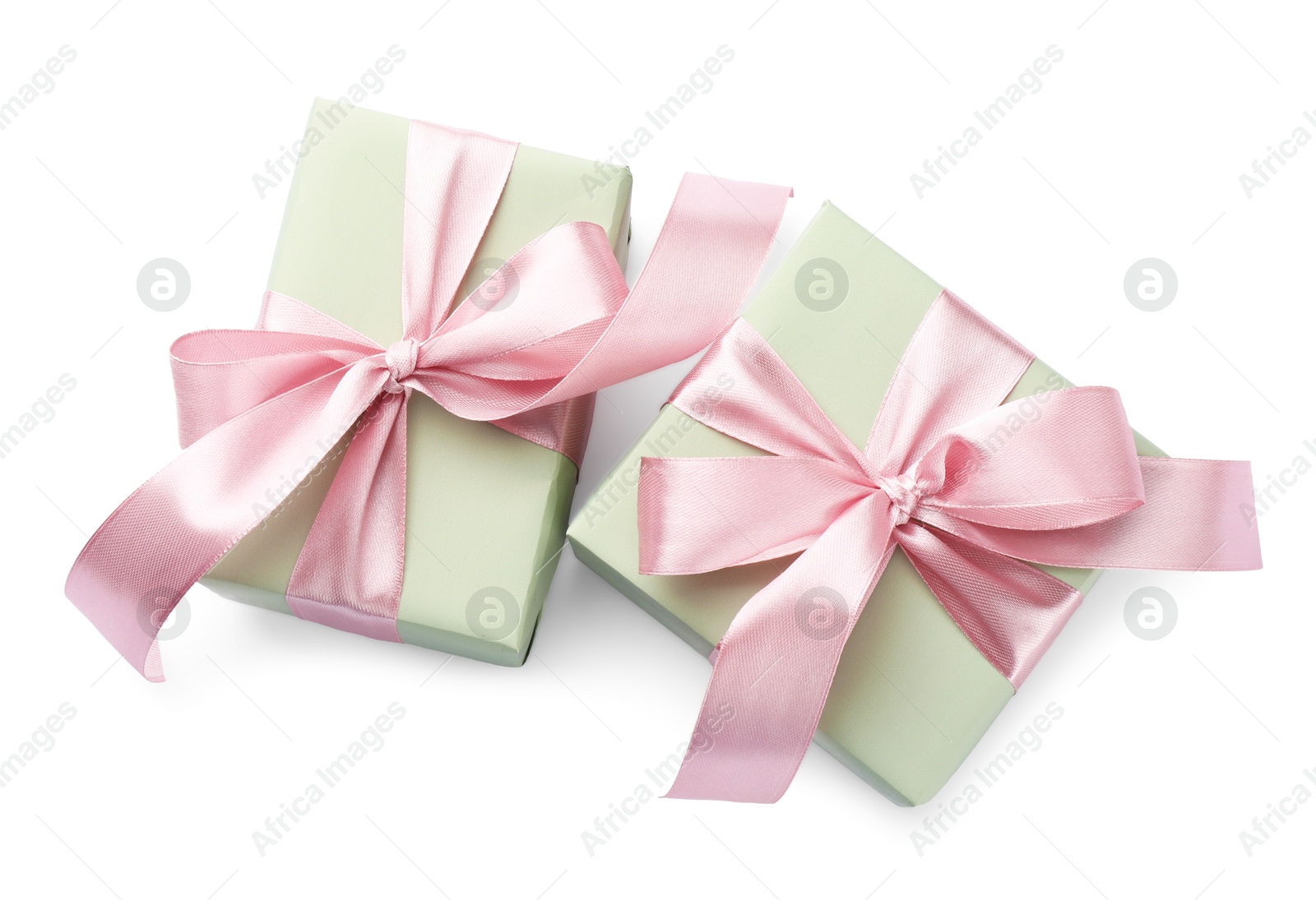 Photo of Beautiful gift boxes with pink bows isolated on white, top view