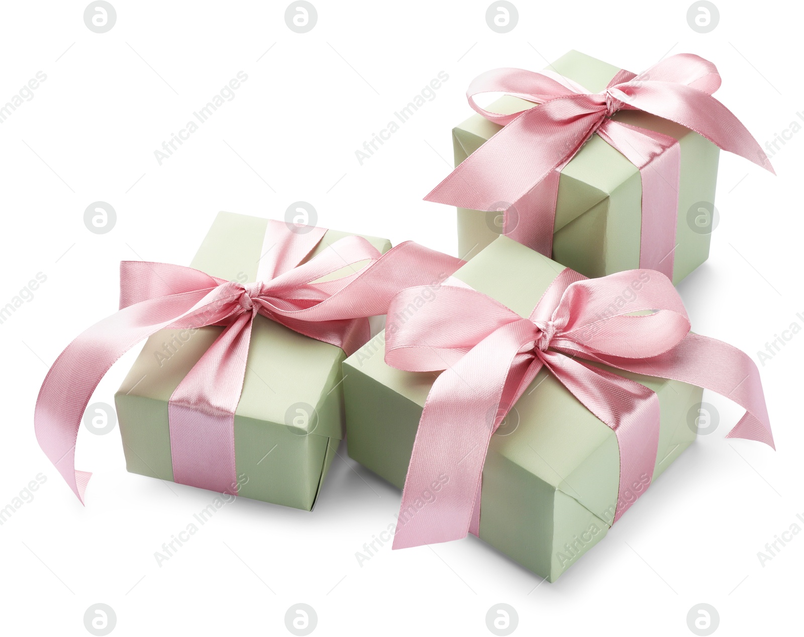 Photo of Beautiful gift boxes with pink bows isolated on white