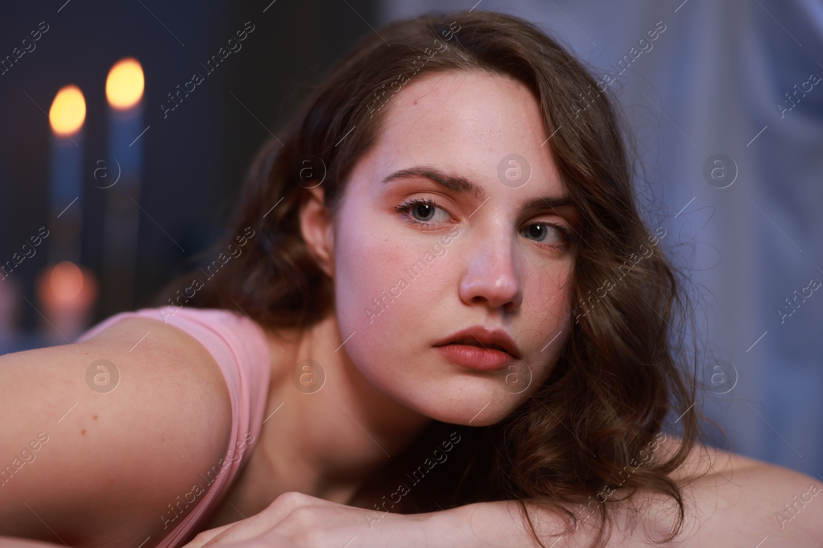 Photo of Beautiful young woman in room, closeup. Fashion vintage style portrait