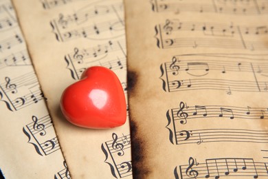 Photo of Heart figure on musical note sheets, closeup