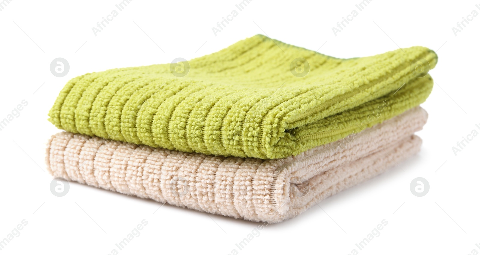 Photo of Green and beige microfiber cloths isolated on white