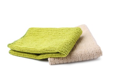 Photo of Green and beige microfiber cloths isolated on white