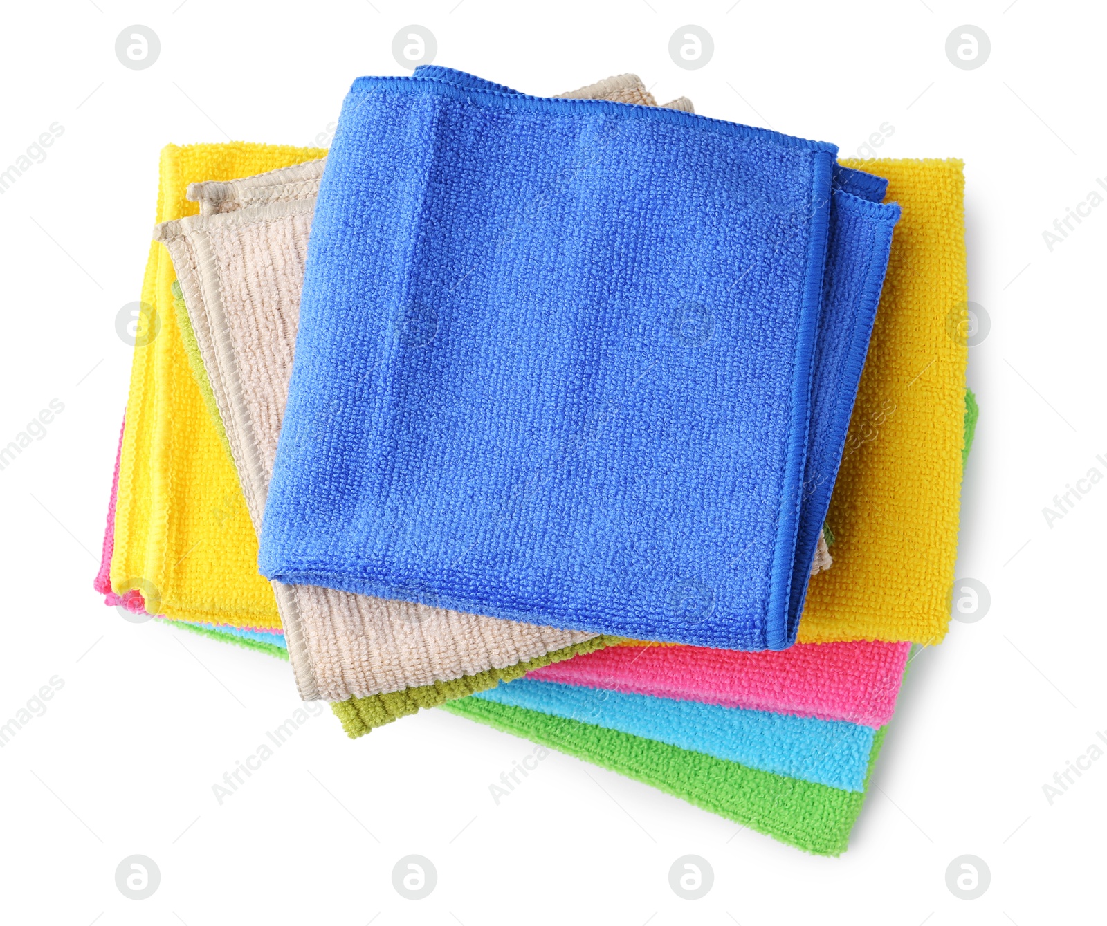 Photo of Stack different microfiber cloths isolated on white, top view