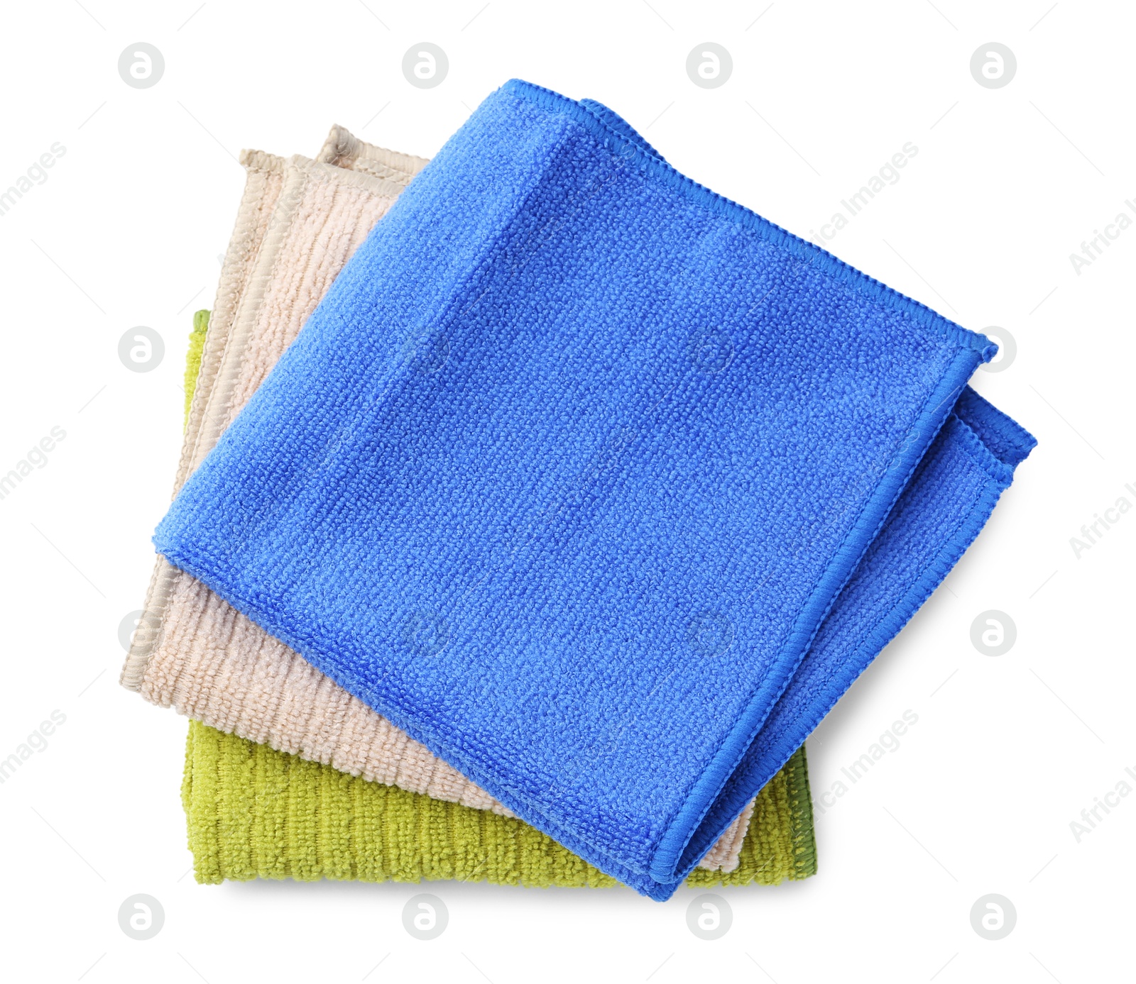 Photo of Stack different microfiber cloths isolated on white, top view