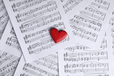 Photo of Heart figure on musical note sheets, top view