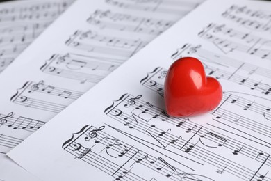 Photo of Heart figure on musical note sheets, closeup