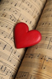 Photo of Heart figure on musical note sheets, closeup