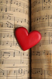 Heart figure on musical note sheets, closeup