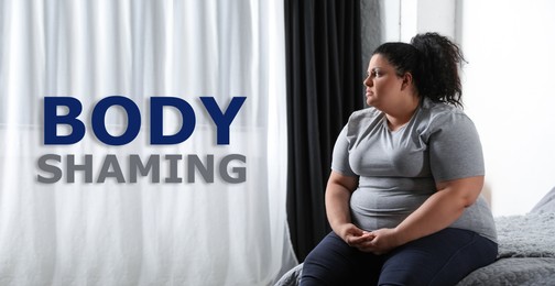 Stop body shaming. Depressed overweight woman sitting on bed at home. Banner design