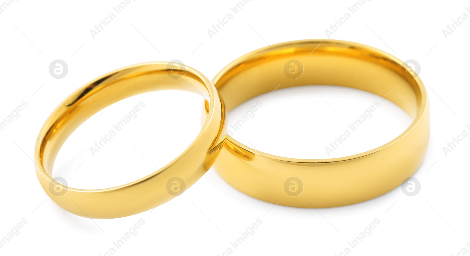 Photo of Beautiful golden wedding rings isolated on white