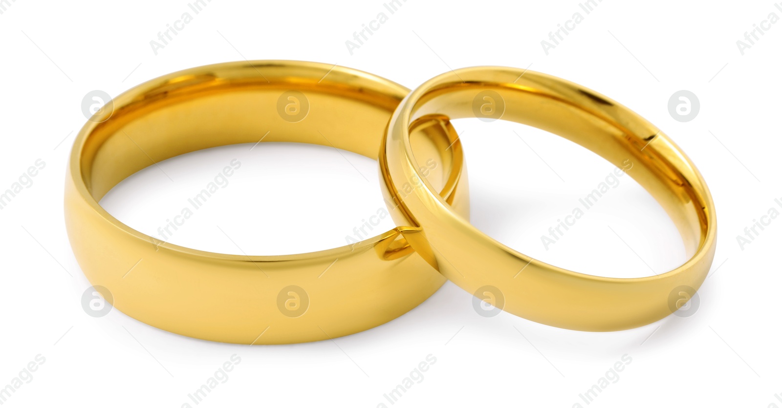 Photo of Beautiful golden wedding rings isolated on white