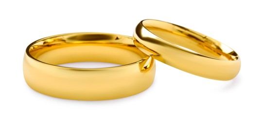 Photo of Beautiful golden wedding rings isolated on white