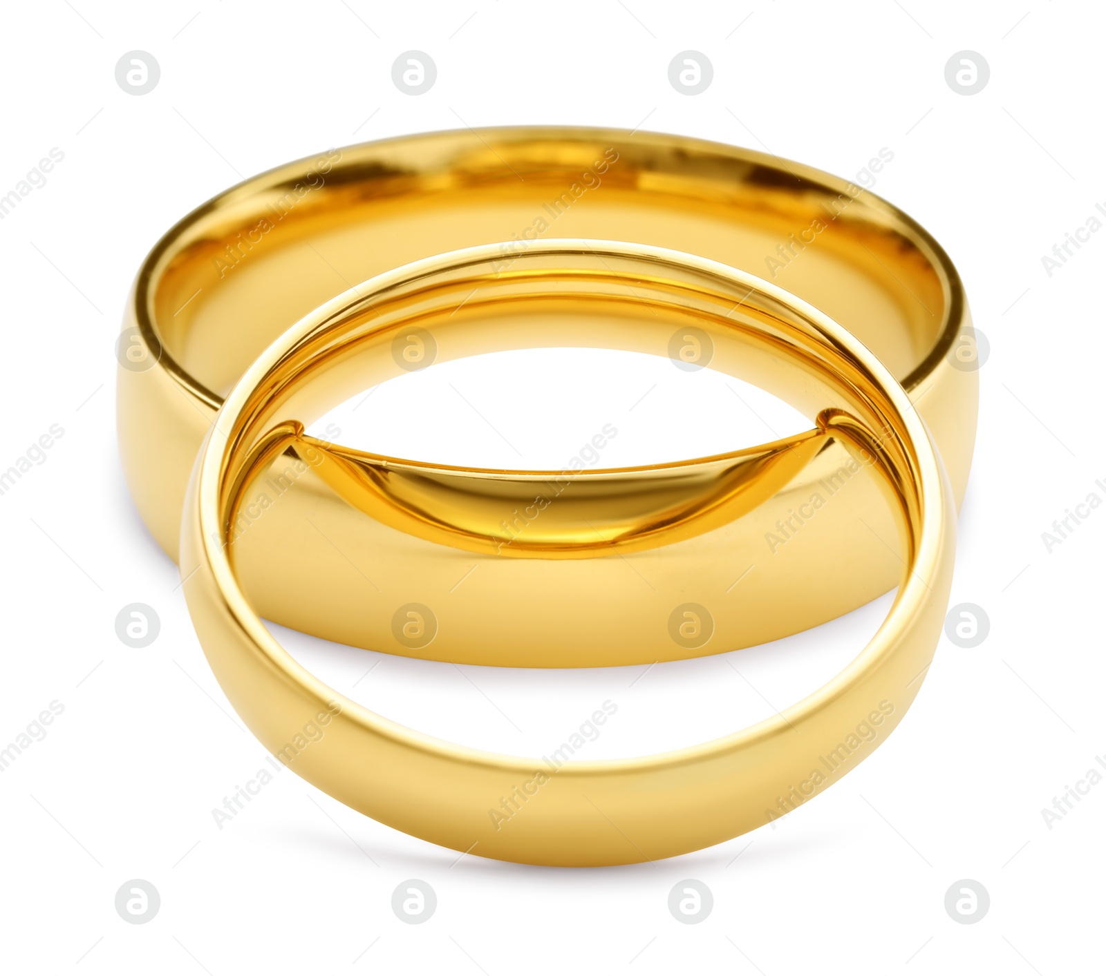 Photo of Beautiful golden wedding rings isolated on white